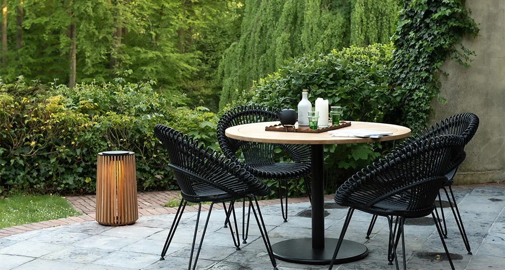 Roxy Dining Chair is a contemporary outdoor dining chair with wicker and aluminium frame and steel base and is suitable for hospitality and contract projects