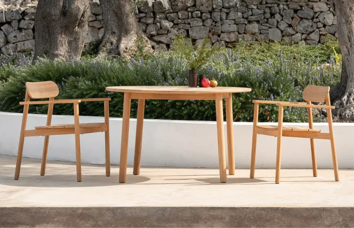 the sam dining table can be used in patios and other outdoor spaces